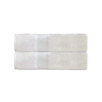 A pair of 2 folded bath towels in white background