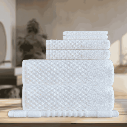 Wholesale hotel towels with an elegant touch, offering versatility in quantity and perfect for enhancing washroom setups for B&Bs and boutique accommodations. DT Series Towel Set - 7 Pc Background