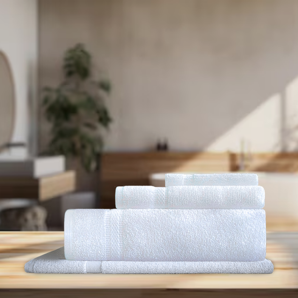 4 different towels in a set placed on the table stacked up on one another