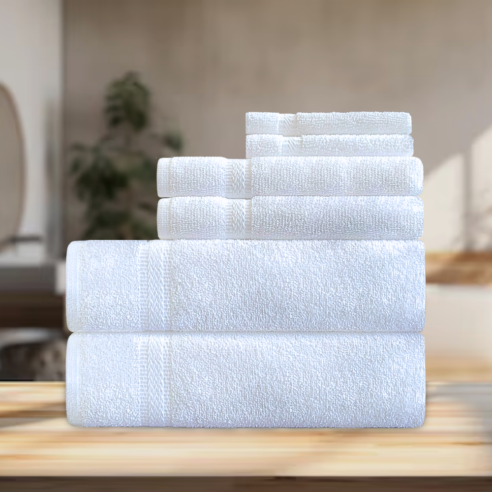3 sets of different towels placed together on the table